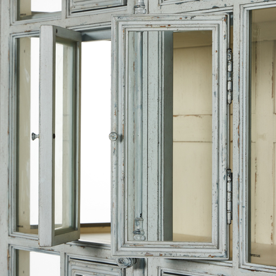The "You Will Need A Lot Of Hinges" Cabinet by Four Hands