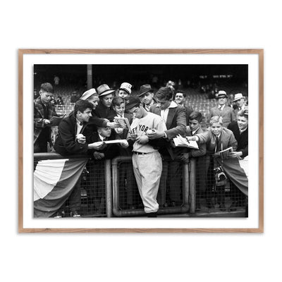 Joe Dimaggio Signing Autotgraphs By Getty Images by Four Hands