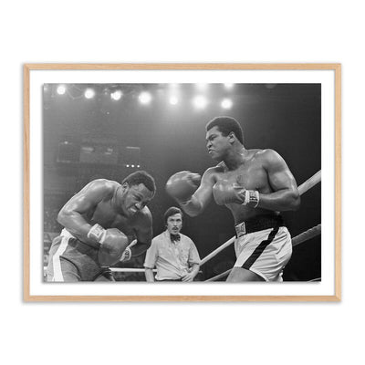 Muhammad Ali Punching Joe Frazier By Getty Images by Four Hands