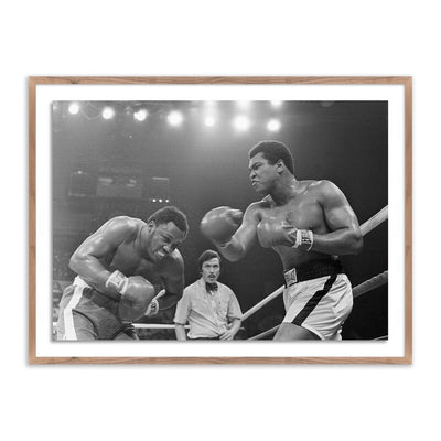 Muhammad Ali Punching Joe Frazier By Getty Images by Four Hands