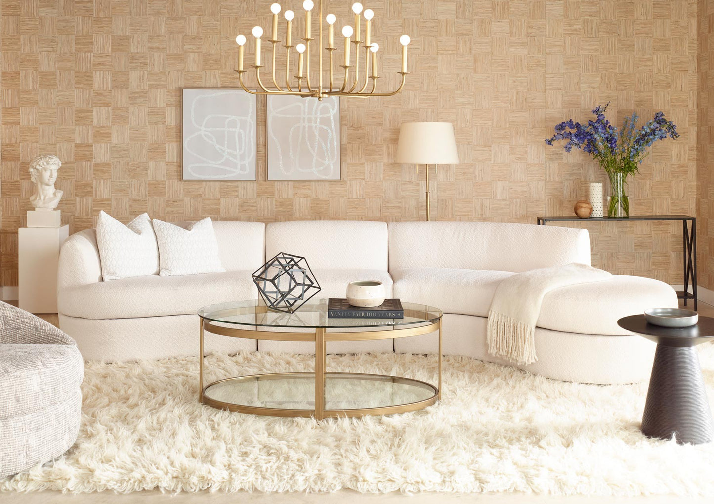 ANDERS sectional in a bright living room with brass accents