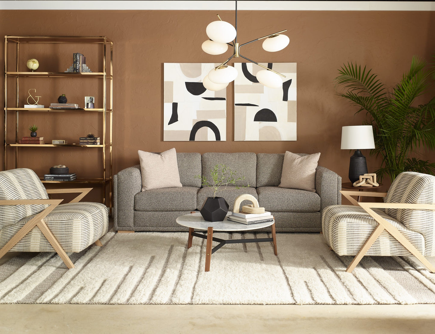 OLSEN sectional in a warm living room, gray fabric with taupe toss pillows